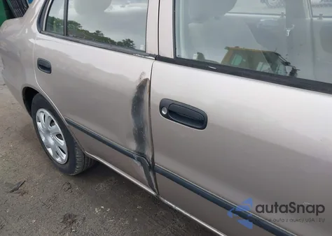 2001 Toyota Corolla Ce z USA, uszkodzony, nr VIN 2T1BR12EX1C416688